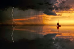 sailboat in pending storm - Photo by Johannes Plenio:
